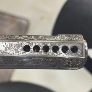 Engraved 1911 slide with six precision-machined barrel ports near the muzzle