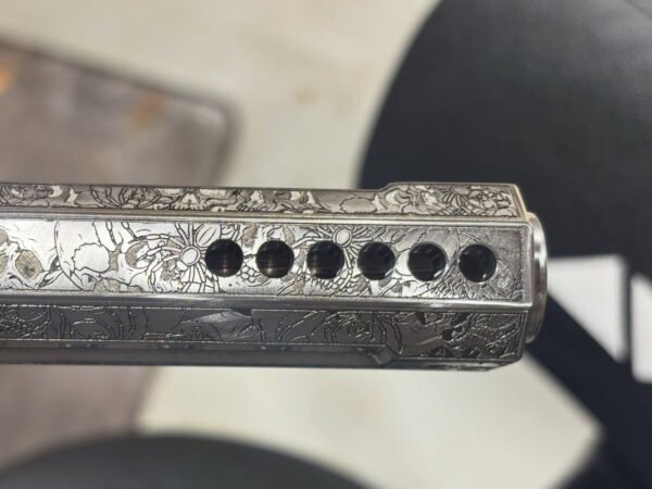 Barrel Porting Engraved 1911 slide with six precision-machined barrel ports near the muzzle